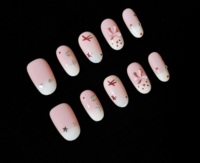 Faux ongles à presser ovales roses faits main avec nœud français, ongles en gelée blanc laiteux à coller, réutilisables et ajustables sur mesure