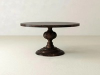 Table à manger ronde moderne en bois massif artisanal, base sur pied robuste, finition naturelle foncée, salle à manger, restaurant, boutique, hôtel
