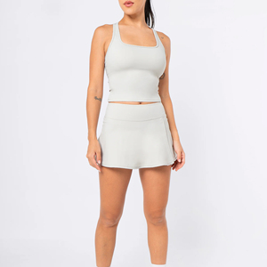 ชุดยูนิฟอร์มเทนนิส OEM ระบายอากาศได้ดี เสื้อเทนนิสน้ำหนักเบา พร้อมกระโปรงกางเกงขาสั้น ชุดกีฬาสำหรับมืออาชีพ - Product Image 1