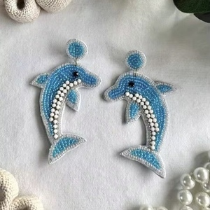 Handmade Beaded Hummingbird <b>Earrings</b> Beads Embellished Hand Crafted Parrot <b>Stud</b> <b>Earrings</b> from the brand BaubleBar - Product Image 4
