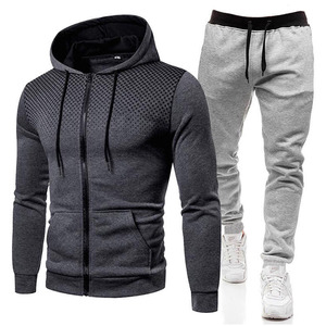 Premium men's coordinated athletic sets. Sleek hoodies and matching <b>joggers</b> in soft. breathable fabric. Ideal for gym. - Product Image 1