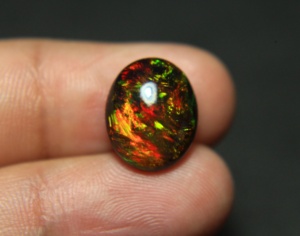 Ópalo negro etíope genuino de 14x11.5x6.5mm, piedra preciosa de 5 quilates, cabujón de ópalo natural multicolor de fuego, corte ovalado, piedra suelta para joyería. - Product Image 1