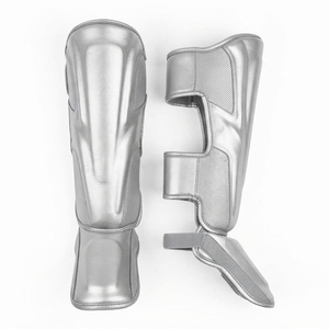 Espinilleras Unisex con Logotipo Personalizado, Protección Profesional, Plegables, Resistentes, Antideslizantes, Fabricadas en Cuero Vacuno para Boxeo - Product Image 1