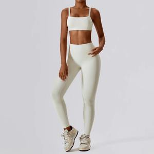Leggings y Sujetador Deportivos de Yoga para Mujer, Diseño Nuevo y Moderno, Venta al Por Mayor, Sin Costuras, Alta Elasticidad, Color Sólido, con Bolsillo - Product Image 1