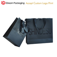 Sacs cadeaux de luxe en tissu noir faits à la main avec ruban pour l'impression de logo de petite entreprise