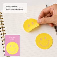Bloc-notes autocollant avec visage souriant