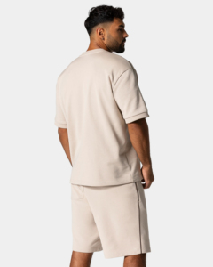 ชุดฤดูร้อนสีพื้นใส่สบายสำหรับผู้ชาย เสื้อยืดผ้าฝ้ายสั่งทำ กางเกงขาสั้นผ้าเจอร์ซีย์ ป้องกันขนร่วง ทรงหลวมไหล่ตก - Product Image 5