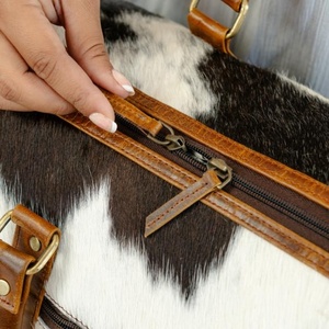 กระเป๋าเดินทางหนังวัววินเทจสำหรับผู้ชายและผู้หญิง - Product Image 5