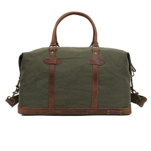 Premium Vintage Canvas Travel Duffle Bag Large Capacity Weekender with Genuine Leather Trim and Brass Hardware - Product Image 5