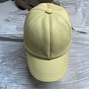 This is a <b>yellow</b> leather baseball cap - Product Image 3