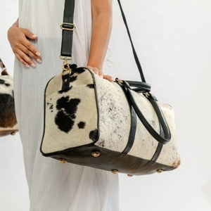 กระเป๋าเดินทางหนังวัววินเทจสำหรับผู้ชายและผู้หญิง - Product Image 3