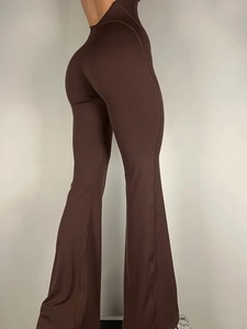 Maßgefertigter Großhandel Damen Nahtloser Yoga-Bodysuit Sexy Einteiliger Bauchkontroll-Jumpsuit mit ausgestelltem Bein - Product Image 5