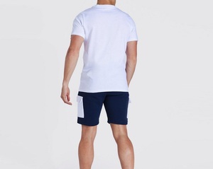 Conjunto de Camiseta Blanca de Cuello Redondo para Hombre, Diseño Simple, Ligera y Transpirable, 100% Algodón, con Pantalones Cortos Casuales con Cintura Elástica Azul Marino - Product Image 2