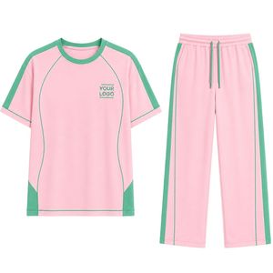 Ensemble décontracté deux pièces rose bébé et vert menthe pour femme : T-shirt oversize et pantalon large avec empiècements contrastants - Product Image 3