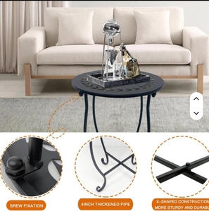 Support décoratif pour plantes en métal noir avec plateau rond découpé en forme de feuille, pieds courbés et base en X robuste, idéal pour les fleurs - Product Image 3