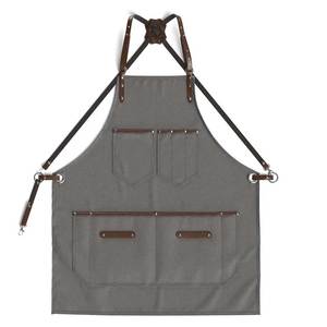 Delantal unisex de lona con correas de cuero y bolsillos, logotipo personalizado impreso, para uso en restaurantes y bares. - Product Image 1
