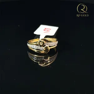 Elegant <b>gold</b> diamond <b>ring</b> with modern swirl design for women perfect for daily wear wedding gift and special occasions - Product Image 1