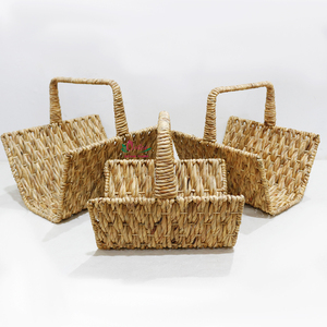Juego de cestas anidadas de jacinto de agua tejidas a mano con asas para almacenamiento y decoración del hogar. - Product Image 3