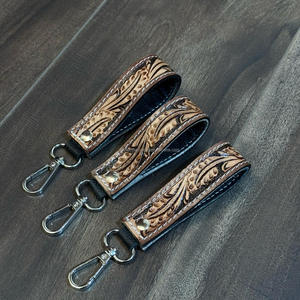 Nuevo diseño de alta calidad de cuero mecanizado a mano de cuero de vaca genuino personalizado Mini Key Clip llavero de muñeca accesorios de mujer - Product Image 4