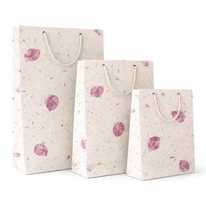 Luxury Eco Friendly <b>Paper</b> Bag for Premium Product Packaging Gift Bag with Durable Custom Design Twisted Handles Shopping Bags - Product Image 1