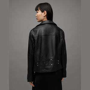 Veste en cuir de vachette noire de luxe, doublée de fourrure, imperméable et coupe-vent pour femme, veste en cuir de moto personnalisée pour l'hiver et les activités de plein air - Product Image 2