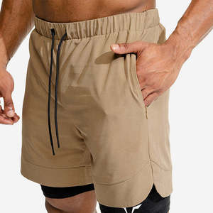 Shorts de sport pour homme en polyester tricoté, couleur unie, séchage rapide, respirant, taille mi-haute avec cordon de serrage et poches - Product Image 1