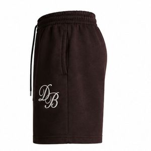Shorts de sport décontractés en molleton épais pour homme, noirs, avec cordon de serrage et logo brodé, fabricant OEM ODM - Product Image 4