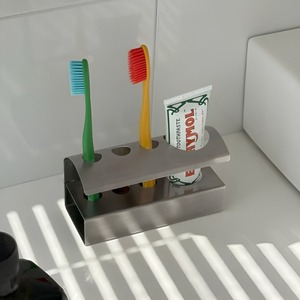 ที่วางแปรงสีฟันสแตนเลสสตีลรูปทรงแปลกตาสีเงิน งานฝีมือสร้างสรรค์ สไตล์ยุโรป สำหรับแปรงสีฟันคู่ - Product Image 1