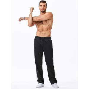 กางเกงแทร็คผู้ชายลำลองแบบยืดได้ ทรงขากว้าง ลายแถบสีตัดกัน ทรงเทเปอร์ พร้อมเชือกผูกเอว กางเกงวอร์มขายาวทรงขากว้าง - Product Image 4