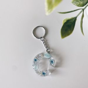 Elegant Resin <b>Key</b> Ring With Minimalist Geometric Design And Gold Hardware For Modern Fashion Style - Product Image 1