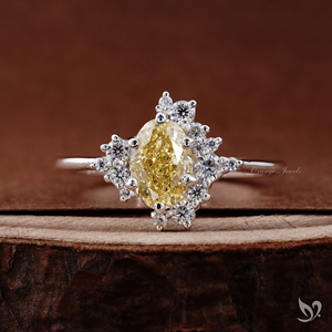 Bague de fiançailles élégante en or blanc 10 carats avec diamant de laboratoire ovale jaune intense de 1,01 carat - Product Image 1