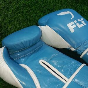 ถุงมือฝึกซ้อมหนังหลากสี Fly พร้อมสายรัดปรับได้ บุนวมอย่างดี สวมใส่สบาย เหมาะสำหรับมวยไทย MMA มวยสากล รุ่น CP-BG-218 - Product Image 3