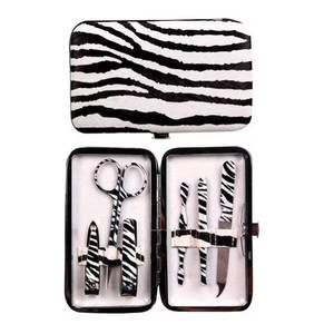 Kit de manucure classique vert imprimé zèbre avec coupe-ongles, ciseaux, lime et étui portable à ressort unique 10-en-1 pour usage adulte - Product Image 5
