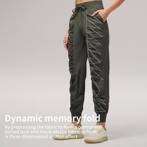 กางเกงวอร์มจ็อกเกอร์ทรงหลวมระบายอากาศได้ดีสำหรับผู้หญิง มีกระเป๋าเก้าจุด กระชับสัดส่วน เหมาะสำหรับวิ่ง ออกกำลังกาย โยคะ ผลิตจากผ้าสแปนเด็กซ์/ไนลอน - Product Image 2