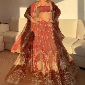 เลเฮนกาโชลีผ้าไหมรัสต์สุดพิเศษพร้อมงานปักดิ้น  เลเฮนกาโชลีสำหรับงานแต่งงานจากดีไซเนอร์ - Product Image 1