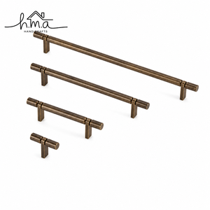 <b>Antique</b> Brass Cylindrical Cabinet Handle with Smooth Finish and Round Bar Design Featuring Minimalist Straight Shape Mounts - Product Image 1