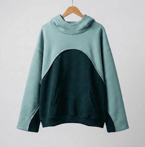 Sweat à capuche en molleton épais bicolore vert clair et foncé pour homme avec panneau incurvé et poche kangourou OEM ODM Vente en gros - Product Image 1