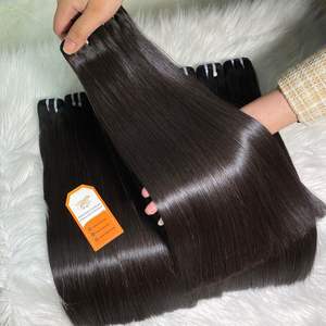Prêt à expédier des extensions de cheveux humains non transformés de donneur brut vietnamien droit d'os de couleur noire Machine à Double trame de paquets de cheveux - Product Image 4