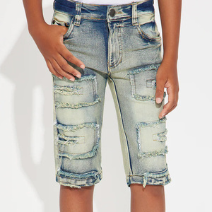 กางเกงยีนส์ขาสั้นเด็กผู้ชายพร้อมออกแบบโลโก้ตามสั่ง เนื้อผ้าทนทาน ดีไซน์ทันสมัย เหมาะสำหรับใส่ลำลองและเล่นกลางแจ้ง - Product Image 2