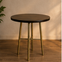 Table basse ronde moderne avec plateau en noyer et pieds en métal, design durable, meubles de salon de style mid-century