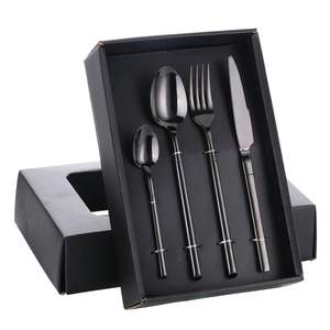 Juego de cubiertos de acero inoxidable negro de lujo diseñado para una experiencia gastronómica moderna y elegante. Acabado de espejo liso que realza la mesa de lujo. - Product Image 1