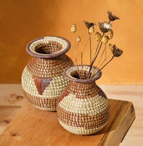 Set of two <b>small</b> patterned woven rattan <b>vases</b> with wide rims and round bodies, available at wholesale prices. - Product Image 1