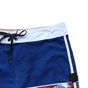 Shorts de plage pour hommes à taille haute, sportifs, écologiques, avec cordon de serrage, séchage rapide, tissu léger, vente en gros directe d'usine OEM - Product Image 4
