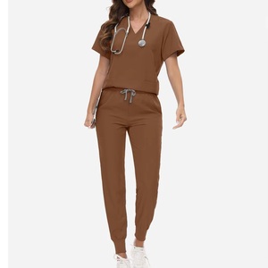 Nouvel ensemble de blouses d'infirmière unisexe haut de gamme 2026 – Uniforme confortable et pratique avec pantalon jogger en tricot 100 % polyester – Marque privée - Product Image 1