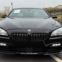 BMW Alpina B6 Gran Coupé 2017 d'occasion, 600 ch, V8 biturbo, transmission intégrale, pack Executive, noir rubis métallisé