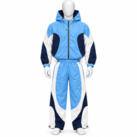Ensemble survêtement streetwear imperméable pour homme 2026 : veste coupe-vent oversize et pantalon à ourlet zippé ajustable