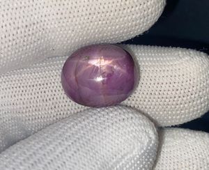 ทับทิมธรรมชาติ 23.15 กะรัต สีแดงอมม่วง คอรันดัม |   พลอยรูปไข่ขนาดใหญ่แบบหลวม - Product Image 2