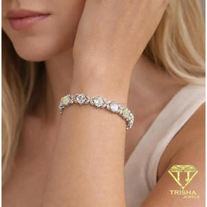 Elegante pulsera en tono plateado con piedras redondas transparentes y detalles florales metálicos abiertos para revendedores de joyería - Product Image 5