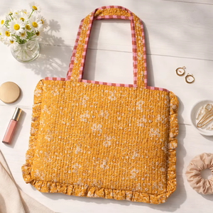 Funda acolchada para portátil de algodón naranja claro con correas para el hombro y cierre de asa - Product Image 1