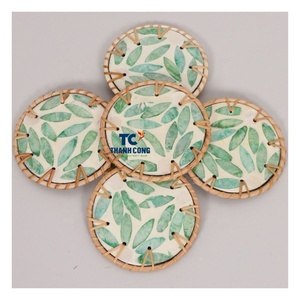 Meilleure vente Ensemble de sous-verres en nacre faits à la main avec bord en rotin faits à la main au Vietnam pour les gros acheteurs Décorations de table - Product Image 1